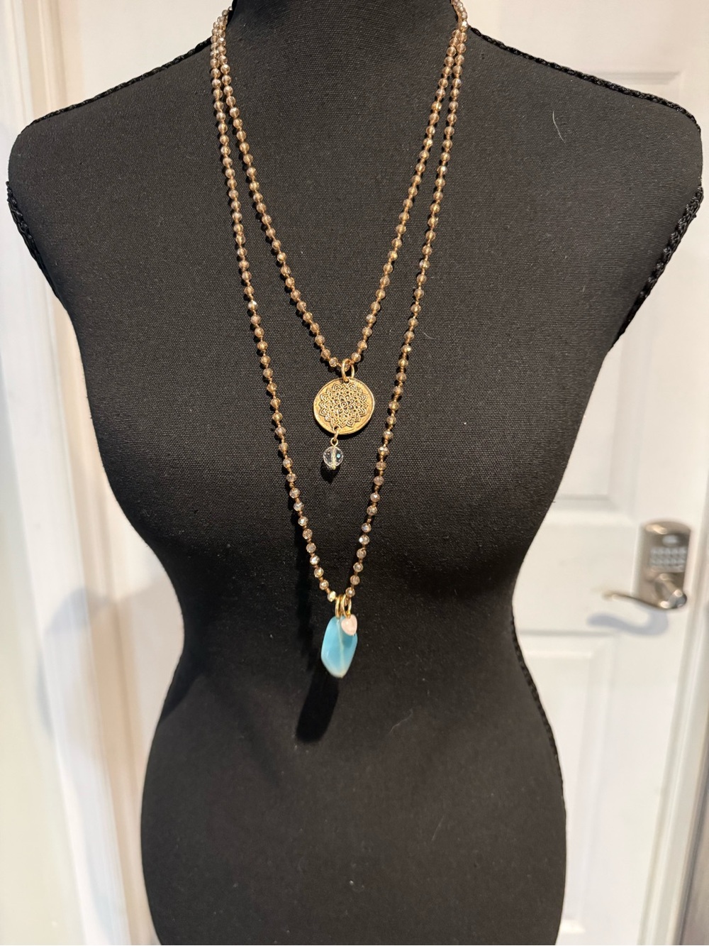 Katia Designs Gold-Tone Survivor Pendant Crystal bead Necklace with Blue Charm